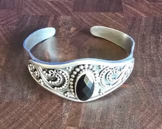 Sterling silver and faceted black onyx gemstone cuff bracelet. 