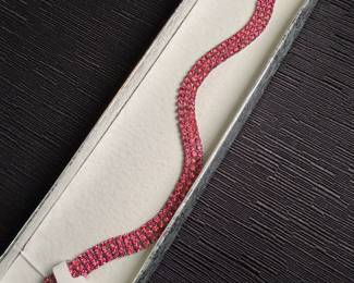 Multi-row pink costume bracelet