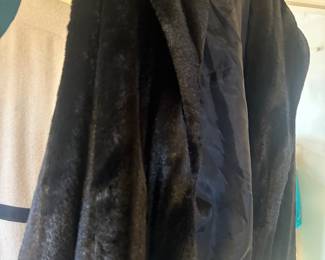 black faux fur coat