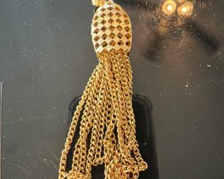 vintage pendant featuring multi-layered tassels