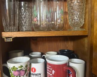Coffee mugs and various glassware