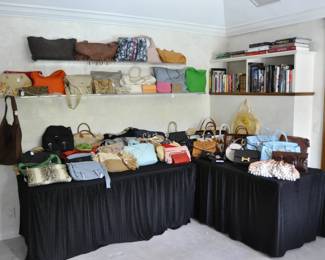 A collection of replica purses...