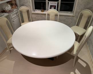 54" diameter MCM marble top table with steel scylpture base