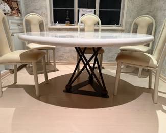 54" diameter MCM marble top table with steel scylpture base