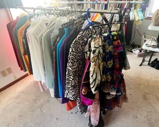 MORE RACKS FULL OF NICE CLOTHING