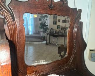 CARVED TRIM & BEVELED GLASS MIRROR