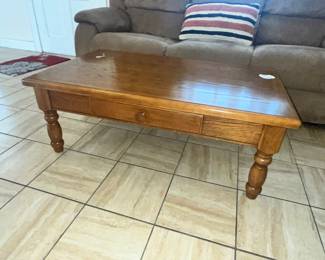 ASHLEY OAK COFFEE TABLE