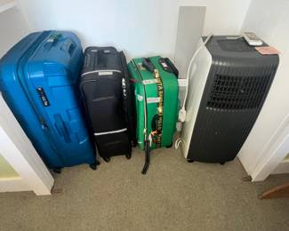 LUGGAGE & A PORTABLE A/C UNIT