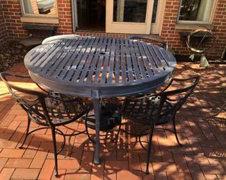 Table by Restoration Hardware and chairs by brown Jordan