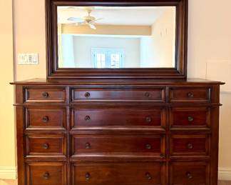 $400 Wooden dresser with 12 drawers, 66 x 19 x 41.5 (Mirror included/attached.) 