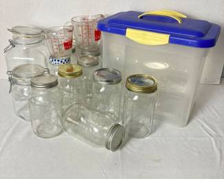  Canner’s Corner—Assorted Glass Storage Jars and Measuring Cups with Plastic Container