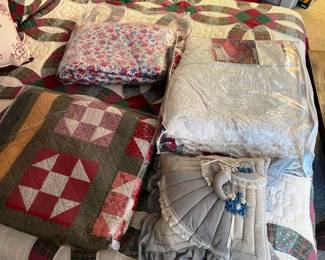 A collection of quilts and blankets