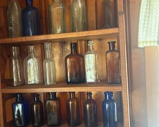 Assorted vintage bottles