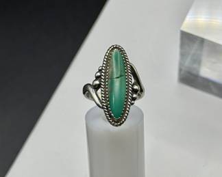 Turquoise and sterling silver ring, size 6 1/4, stamped 925. Very pretty.