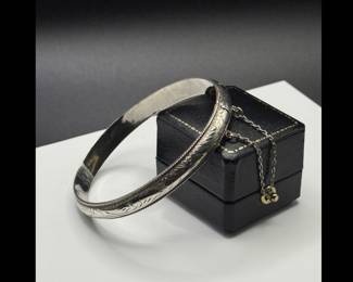 7 inch etched sterling bangle. Stamped 925.