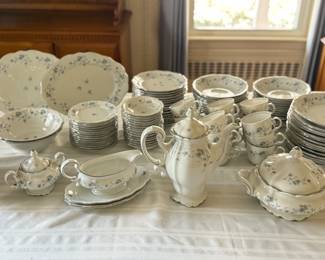 Johann Haviland fine china from Bavaria Germany. Very large collection. Porcelain body with a pretty blue garland floral pattern and a silver edge.

Includes; (28) 8 inch soup bowls,(16) 8 inch plates,(15) 6.5 inch plates(15) 10 inch plates,(15) 5 inch soup bowls (15) coffee cups, cream and sugar bowls,(17)saucers, one coffee pot, one gravy boat, one large covered dish,(2) 8.5 inch vegetable dishes(2) 12.5 inch platters,(2) 9.5 inch sauce plates.