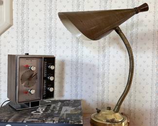 Mixed vintage includes gooseneck desk lamp, Motorola countertop radio and clock, and a book called The Century by Peter Jennings and Todd Brewster. Radio and lamp have been tested.