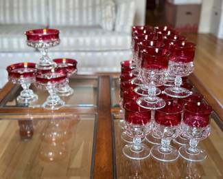 Indiana glass Kings Crown glass set with a flashed red top. (27) 6 inch tall water goblets, and 4 pedestal compote dessert dishes. All matching.