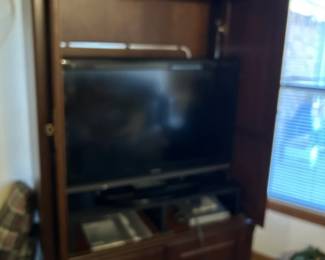 #26	Wood  Entr. Cabinet w/4 Doors (2 slide back) & 2 shelves 41x24x76T - You Move	 $65.00 #27	Toshiba 36" TV w/remote (not flatscreen)	 $45.00 