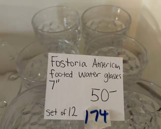 #174	Fostoria American Footed Water Glass Set of 12	 $50.00 