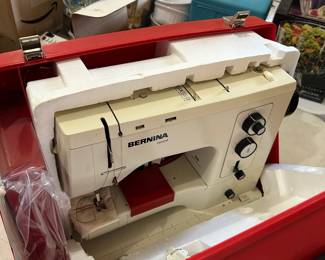 #143	Bernina 830 Record Sewing Machine in Red Case w/pedal, accessories and power cord.  Needs Maintenance but is very sturdy and in good condition.	 $650.00 