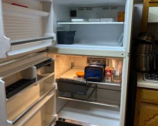 #34	Amana 20cu Refrigerator  (inside house) - No ice maker - has glass shelves	 $75.00 