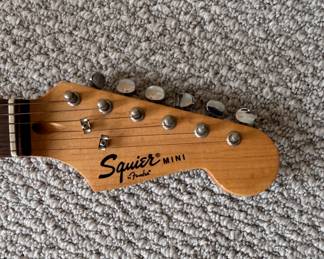 Squire Mini Fender Stratocaster Electric Guitar (Great for Beginners or Travelers). Photo 2 of 2.
