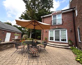 Wrought Iron 5-Piece Patio Set & Umbrella. Photo 1 of 2.