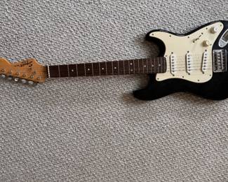 Squire Mini Fender Stratocaster Electric Guitar (Great for Beginners or Travelers). Photo 1 of 2.
