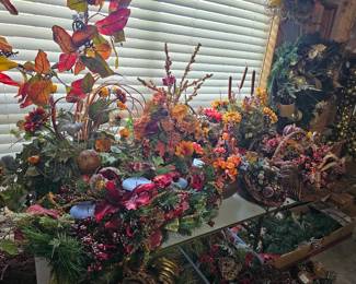 more greenery and artificial flower arrangements