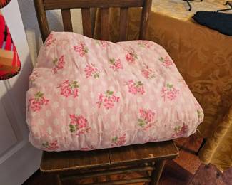 vintage chair with beautiful handmade quilt