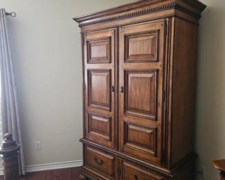 entertainment center with lots of storage and looks