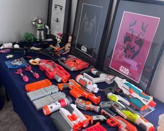 Large Nerf gun collection with Star Wars framed artwork