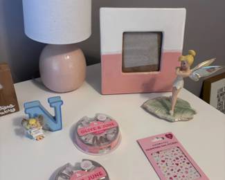 Pink ceramic table lamp, figurines, Olive & June nail set, trinkets