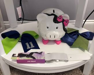 White corner shelf, Squishmallow plush, kids sports jersey