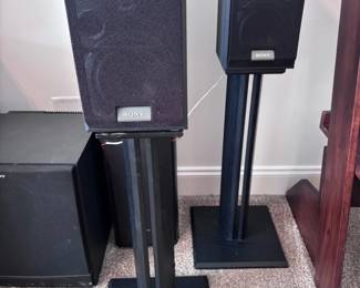 Surround sound speakers on stands with subwoofer