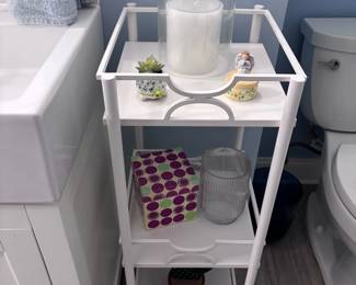 White metal 3-tier rolling cart with decor and storage