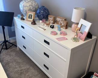 White 6-drawer dresser with black handles