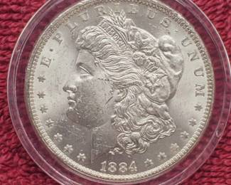 1884-O Morgan Silver Dollar in Airtite, Higher Grade