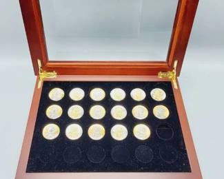 17 Sacagawea Dollars with Gold Highlites in Wooden Case