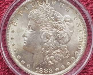 1883-O Morgan Silver Dollar in Airtite, Higher Grade