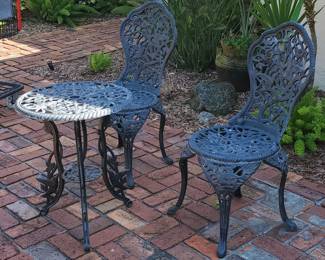Cast iron table and chairs.