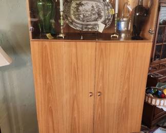  one of four sections--beautiful four section shelving unit style 1990s with glass shelves and lighting,Wallace silver ice bucket with a hinge lid,glass art vases & decanter