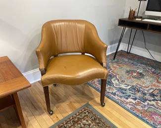 Leather accent chair rolling