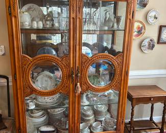 Amazing china cabinet full of goodies. 