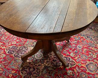 Oak pedestal table.