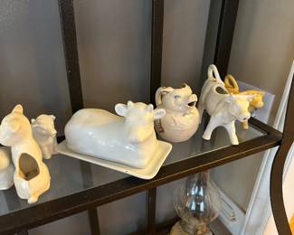 Cow creamers and butter dish. 