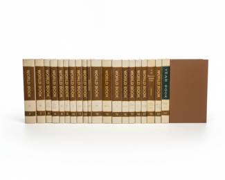 World Book Encyclopedia Set, Applied Practical Electricity Set, and Vintage Metal Ammo Box