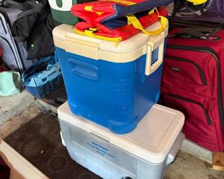 Coolers and luggage.