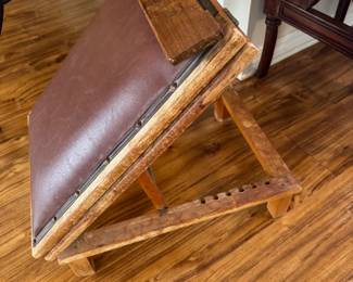 94	$200.00	Antique metamorphic architec's or lectern table, constructed from wood, adjustable, with leather surface (was in Guest room 2)
